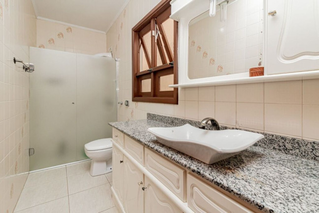 Imagem Casa com 3 Quartos à Venda, 270 m² em Partenon - Porto Alegre Imagem Casa com 3 Quartos à Venda, 270 m² em Partenon - Porto Alegre