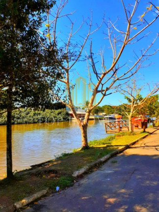 Imagem Sobrado com 6 Quartos à Venda, 347 m² em Jardim Nomar - Caraguatatuba