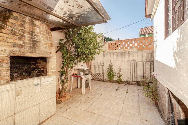 Imagem Casa com 4 Quartos à Venda, 130 m² em Espírito Santo - Porto Alegre Imagem Casa com 4 Quartos à Venda, 130 m² em Espírito Santo - Porto Alegre