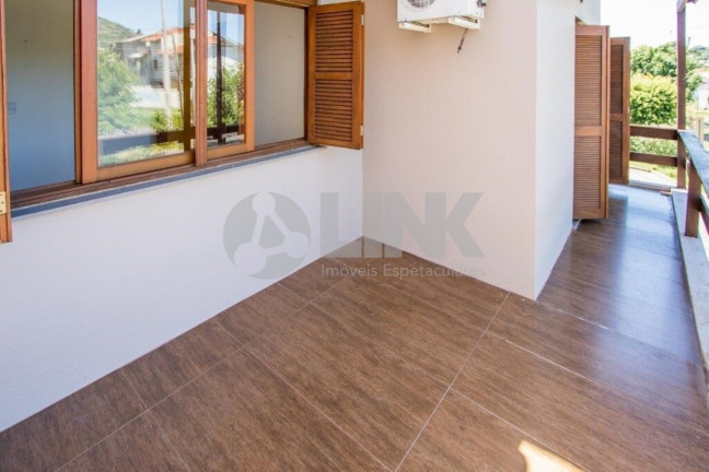 Imagem Imóvel com 3 Quartos à Venda, 196 m² em Guarujá - Porto Alegre