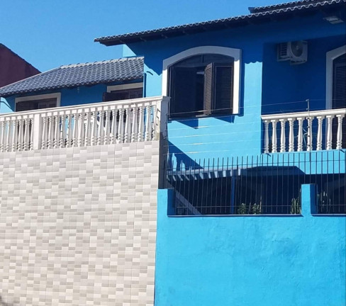 Imagem Sobrado com 5 Quartos à Venda, 238 m² em Niterói - Canoas Imagem Sobrado com 5 Quartos à Venda, 238 m² em Niterói - Canoas