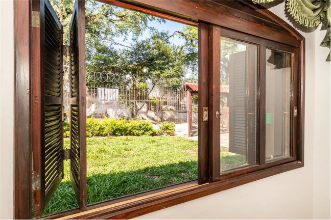 Imagem Casa com 3 Quartos à Venda,  em Santa Tereza - Porto Alegre