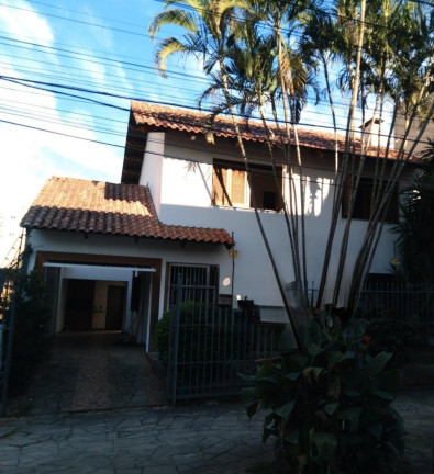Imagem Casa com 3 Quartos à Venda, 242 m² em Santana - Porto Alegre Imagem Casa com 3 Quartos à Venda, 242 m² em Santana - Porto Alegre