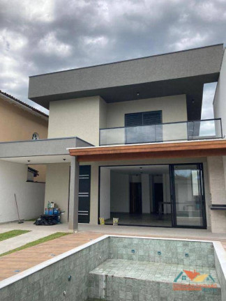 Imagem Sobrado com 4 Quartos à Venda, 180 m² em Balneário Copacabana - Caraguatatuba