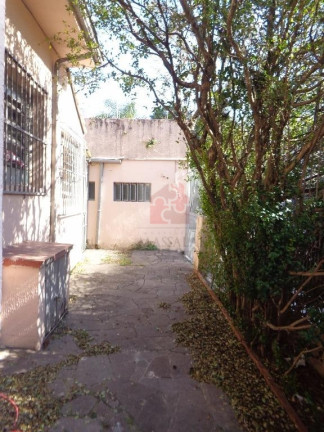 Imagem Casa com 3 Quartos à Venda, 150 m² em Menino Deus - Porto Alegre Imagem Casa com 3 Quartos à Venda, 150 m² em Menino Deus - Porto Alegre