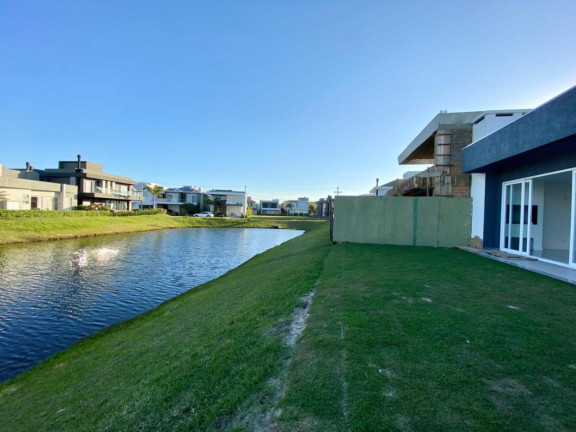 Imagem Casa com 4 Quartos à Venda, 183 m² em Capão Da Canoa - Capao Da Canoa