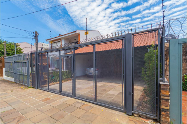 Imagem Casa com 3 Quartos à Venda, 220 m² em Partenon - Porto Alegre Imagem Casa com 3 Quartos à Venda, 220 m² em Partenon - Porto Alegre