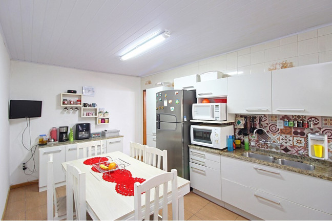 Imagem Casa com 2 Quartos à Venda, 101 m² em Vila Nova - Porto Alegre Imagem Casa com 2 Quartos à Venda, 101 m² em Vila Nova - Porto Alegre