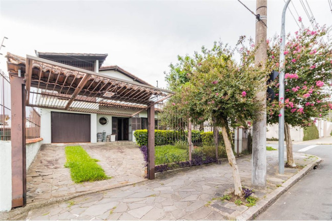 Imagem Casa com 4 Quartos à Venda, 313 m² em Cavalhada - Porto Alegre Imagem Casa com 4 Quartos à Venda, 313 m² em Cavalhada - Porto Alegre