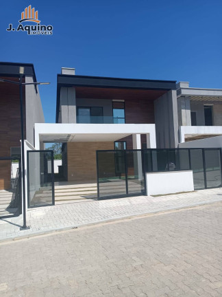 Imagem Casa com 4 Quartos à Venda, 247 m² em Amador - Eusébio Imagem Casa com 4 Quartos à Venda, 247 m² em Amador - Eusébio