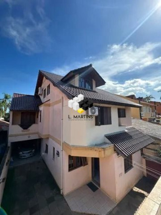 Imagem Casa com 3 Quartos à Venda, 320 m² em Rubem Berta - Porto Alegre Imagem Casa com 3 Quartos à Venda, 320 m² em Rubem Berta - Porto Alegre
