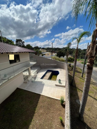 Imagem Casa com 3 Quartos à Venda, 399 m² em Pilarzinho - Curitiba