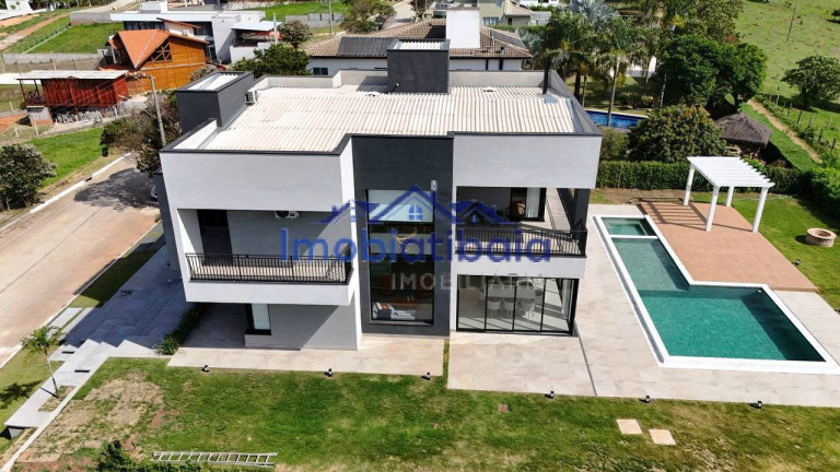 Imagem Casa de Condomínio com 4 Quartos à Venda, 1.039 m² em Lopo - Vargem