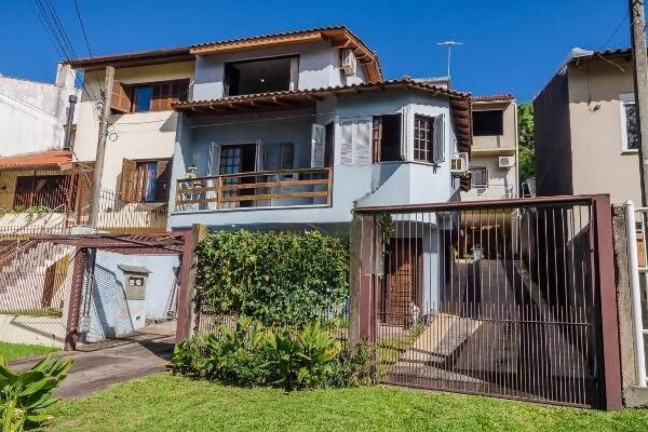 Imagem Casa com 3 Quartos à Venda, 396 m² em Partenon - Porto Alegre Imagem Casa com 3 Quartos à Venda, 396 m² em Partenon - Porto Alegre
