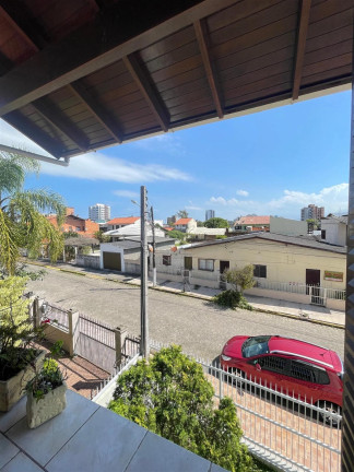 Imagem Casa com 4 Quartos à Venda, 240 m² em Centro - Torres