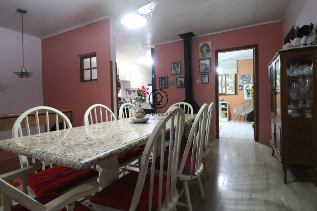 Imagem Casa com 4 Quartos à Venda, 189 m² em Alto Petrópolis - Porto Alegre Imagem Casa com 4 Quartos à Venda, 189 m² em Alto Petrópolis - Porto Alegre