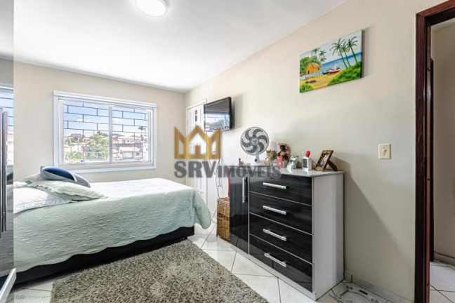 Imagem Sobrado com 3 Quartos à Venda, 129 m² em Santa Cândida - Curitiba