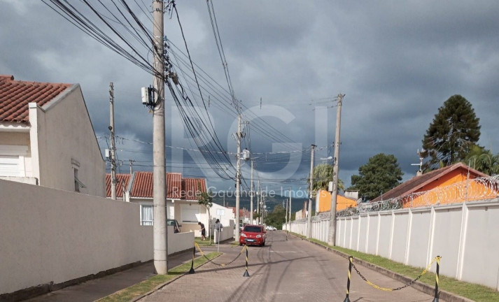 Imagem Casa de Condomínio com 2 Quartos à Venda, 56 m² em Restinga - Porto Alegre Imagem Casa de Condomínio com 2 Quartos à Venda, 56 m² em Restinga - Porto Alegre