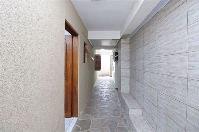 Imagem Casa com 3 Quartos à Venda, 198 m² em Medianeira - Porto Alegre