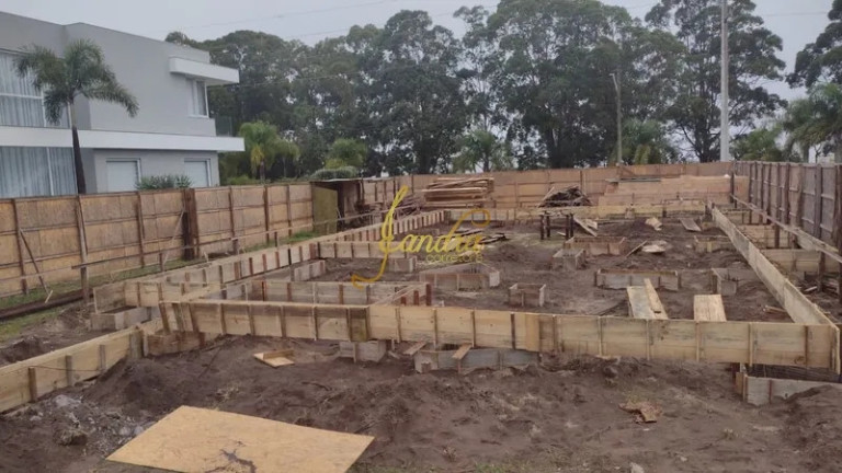 Imagem Casa de Condomínio com 6 Quartos à Venda, 465 m² em Zona Nova - Capão Da Canoa