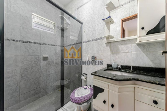 Imagem Sobrado com 3 Quartos à Venda, 129 m² em Santa Cândida - Curitiba