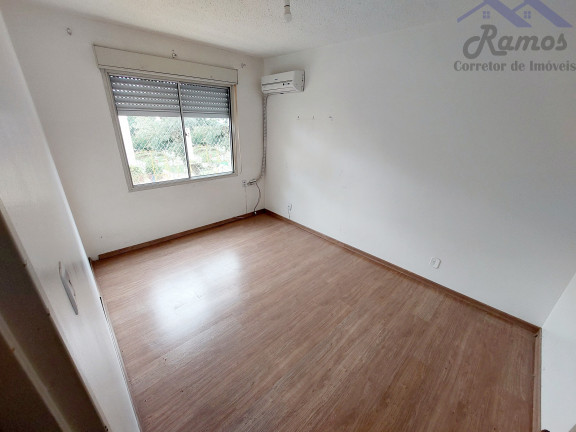 Imagem Imóvel com 2 Quartos à Venda, 50 m² em Vila Nova - Porto Alegre Imagem Imóvel com 2 Quartos à Venda, 50 m² em Vila Nova - Porto Alegre
