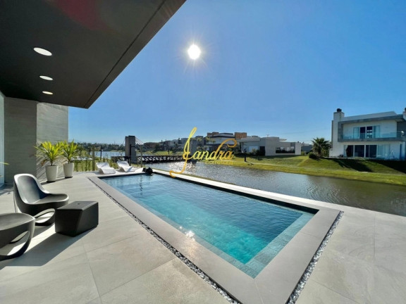 Imagem Casa de Condomínio com 4 Quartos à Venda, 320 m² em Capão Ilhas Resort - Capão Da Canoa Imagem Casa de Condomínio com 4 Quartos à Venda, 320 m² em Capão Ilhas Resort - Capão Da Canoa
