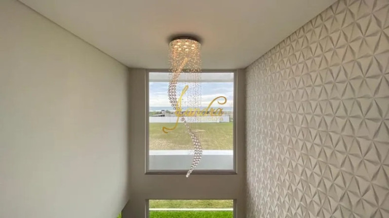 Imagem Casa de Condomínio com 5 Quartos à Venda, 560 m² em Centro - Torres