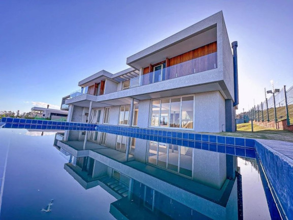 Imagem Casa com 4 Quartos à Venda, em Vila Nova - Porto Alegre Imagem Casa com 4 Quartos à Venda, em Vila Nova - Porto Alegre