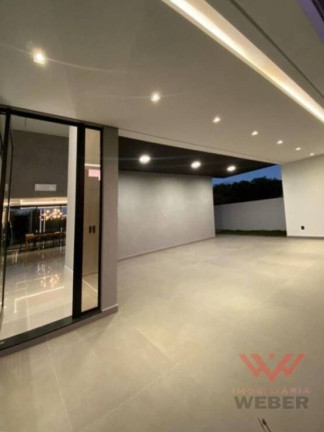 Imagem Casa de Condomínio com 4 Quartos à Venda, 411 m² em Alphaville Nova Esplanada - Votorantim