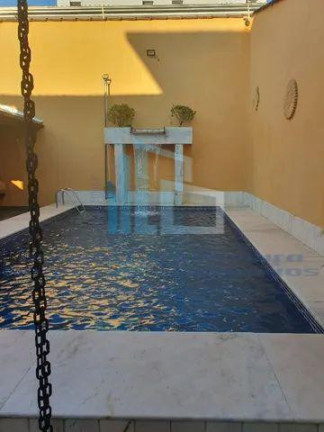 Imagem Casa com 4 Quartos à Venda, 300 m² em Canto Do Forte - Praia Grande Imagem Casa com 4 Quartos à Venda, 300 m² em Canto Do Forte - Praia Grande