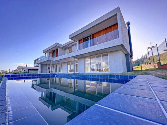 Imagem Casa com 4 Quartos à Venda, em Vila Nova - Porto Alegre Imagem Casa com 4 Quartos à Venda, em Vila Nova - Porto Alegre