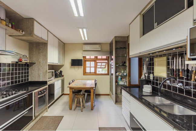 Imagem Casa de Condomínio com 4 Quartos à Venda, 238 m² em Bela Vista - Porto Alegre