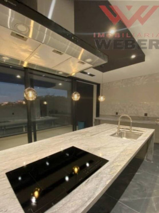 Imagem Casa de Condomínio com 4 Quartos à Venda, 411 m² em Alphaville Nova Esplanada - Votorantim