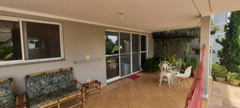 Imagem Casa de Condomínio com 4 Quartos à Venda, 380 m²