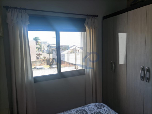 Imagem Sobrado com 3 Quartos à Venda, 137 m² em Stan - Torres Imagem Sobrado com 3 Quartos à Venda, 137 m² em Stan - Torres