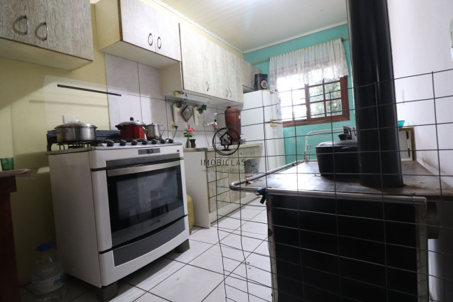 Imagem Casa com 4 Quartos à Venda, 189 m² em Alto Petrópolis - Porto Alegre Imagem Casa com 4 Quartos à Venda, 189 m² em Alto Petrópolis - Porto Alegre