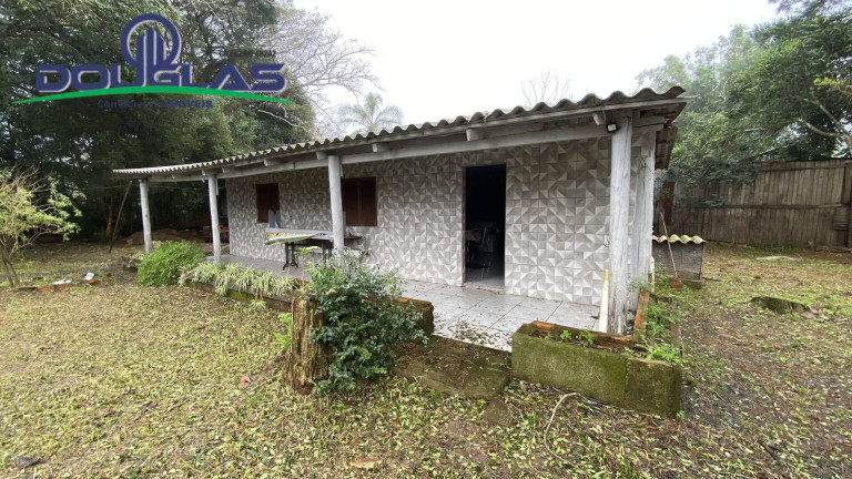 Imagem Casa com 4 Quartos à Venda, 1.500 m² em águas Claras - Viamão