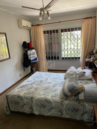 Imagem Casa com 4 Quartos à Venda, 480 m² em Santo Antônio - Porto Alegre
