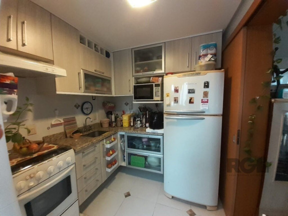 Imagem Imóvel com 2 Quartos à Venda, em Menino Deus - Porto Alegre Imagem Imóvel com 2 Quartos à Venda, em Menino Deus - Porto Alegre