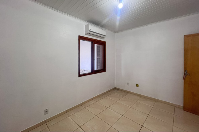 Imagem Casa com 2 Quartos à Venda, 45 m² em Olaria - Canoas Imagem Casa com 2 Quartos à Venda, 45 m² em Olaria - Canoas