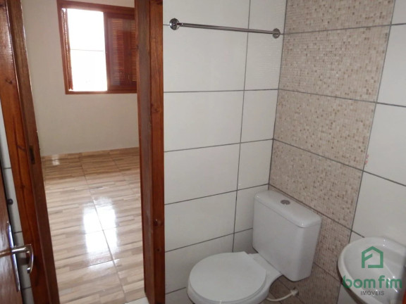 Imagem Casa com 2 Quartos à Venda, 55 m² em Olaria - Canoas Imagem Casa com 2 Quartos à Venda, 55 m² em Olaria - Canoas