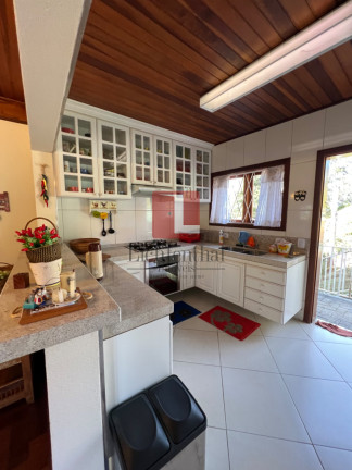 Imagem Casa de Condomínio com 4 Quartos à Venda, 260 m² em Vale Encantado - Campos Do Jordão