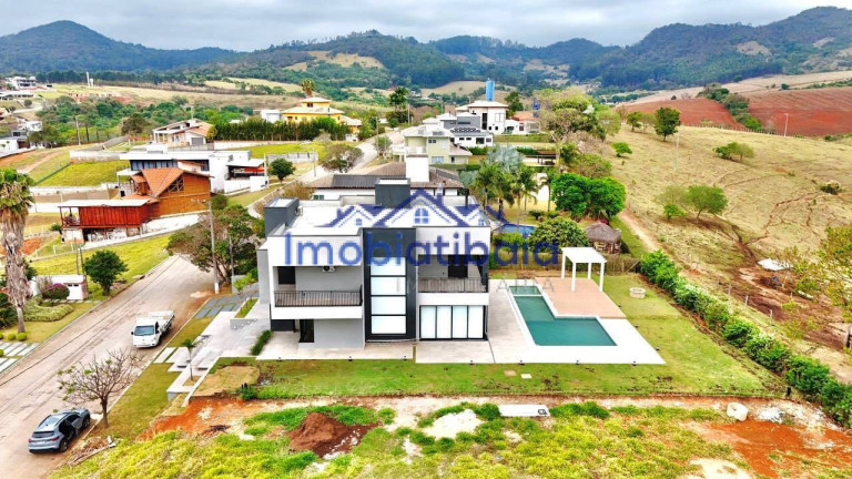 Imagem Casa de Condomínio com 4 Quartos à Venda, 1.039 m² em Lopo - Vargem