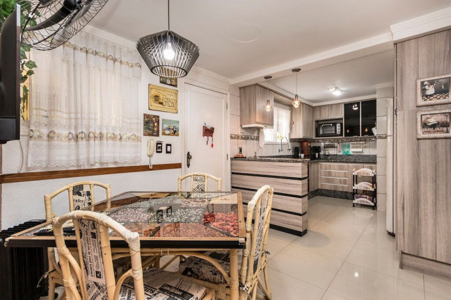 Imagem Casa com 5 Quartos à Venda, 381 m² em Jardim Lindóia - Porto Alegre Imagem Casa com 5 Quartos à Venda, 381 m² em Jardim Lindóia - Porto Alegre