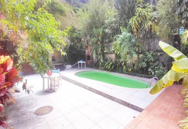 Imagem Casa com 4 Quartos à Venda, 300 m² em Barra Da Tijuca - Rio De Janeiro