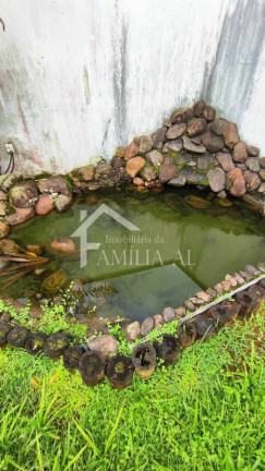 Imagem Casa de Condomínio com 4 Quartos à Venda, 215 m² em Iririú - Joinville