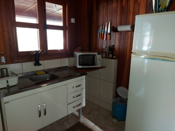 Imagem Casa de Condomínio com 2 Quartos à Venda, 106 m² em Massaguaçu - Caraguatatuba