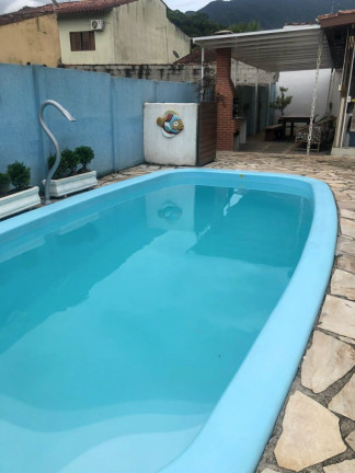 Imagem Casa de Condomínio com 2 Quartos à Venda, 106 m² em Massaguaçu - Caraguatatuba