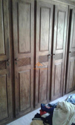 Imagem Casa com 3 Quartos à Venda, 150 m² em Getuba - Caraguatatuba
